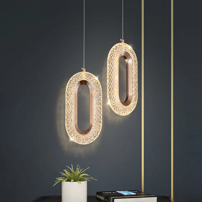 Suspension elliptique nordique en métal doré, lumière chaleureuse design 2025
