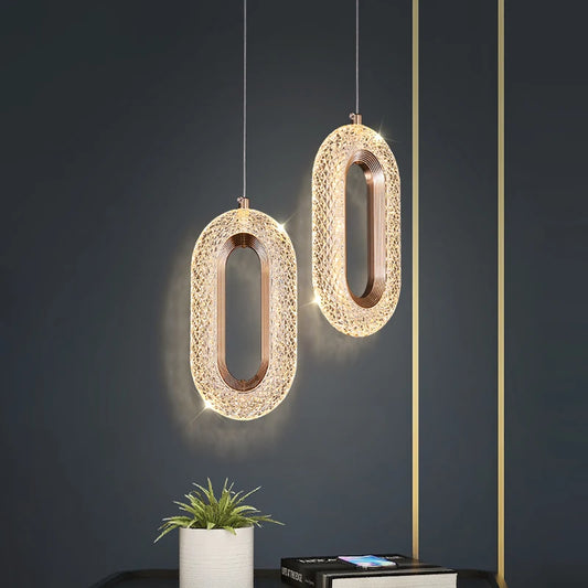 Suspension elliptique nordique en métal doré, lumière chaleureuse design 2025