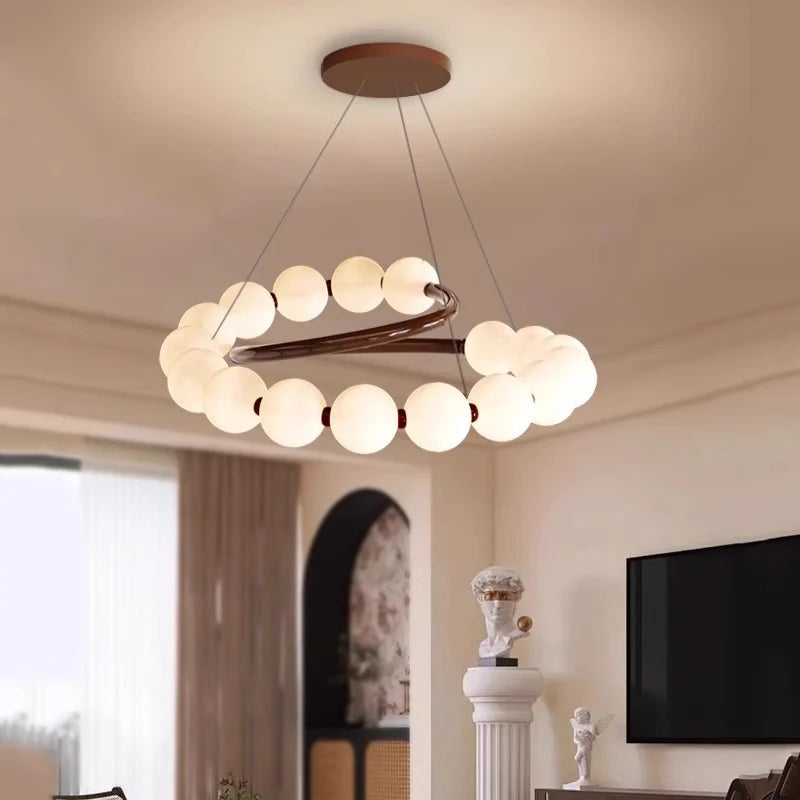 Suspension LED ronde en verre moderne pour intérieur luxe et ambiance chaleureuse