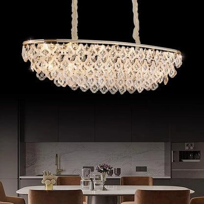 Lustre suspendu en cristal doré, design moderne, lumière chaleureuse pour salon et salle à manger