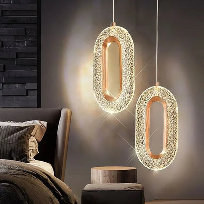 Suspension elliptique nordique en métal doré, lumière chaleureuse design 2025