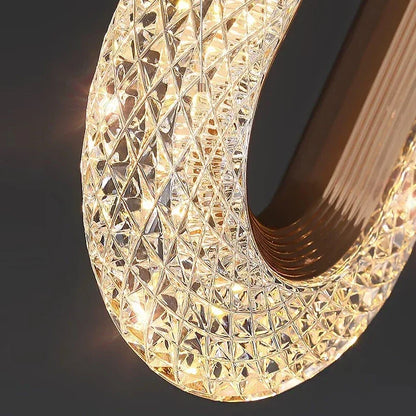 Suspension elliptique nordique en métal doré, lumière chaleureuse design 2025