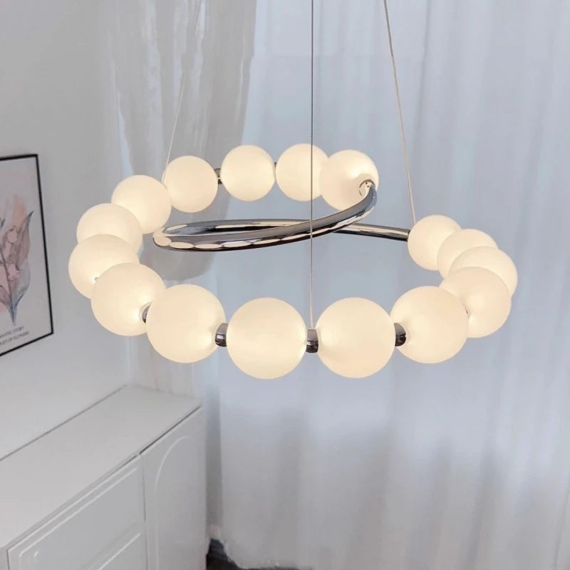 Suspension LED ronde en verre moderne pour intérieur luxe et ambiance chaleureuse