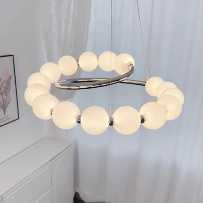 Suspension LED ronde en verre moderne pour intérieur luxe et ambiance chaleureuse