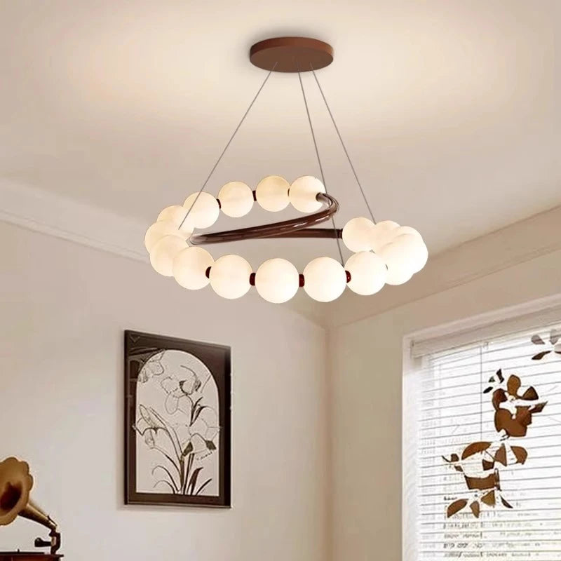 Suspension LED ronde en verre moderne pour intérieur luxe et ambiance chaleureuse