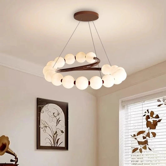 Suspension LED ronde en verre moderne pour intérieur luxe et ambiance chaleureuse