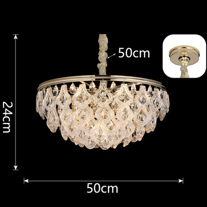 Lustre suspendu en cristal doré, design moderne, lumière chaleureuse pour salon et salle à manger