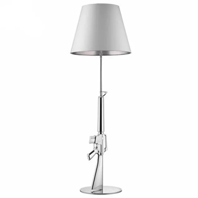 Lampadaire LED AK47 design post - moderne en métal doré, éclairage d’angle pour intérieur - Luminous Place