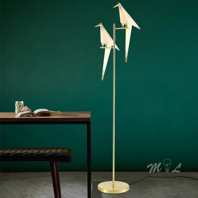 Lampadaire LED design oiseau en acier brossé, lumière chaleureuse d’intérieur - Luminous Place