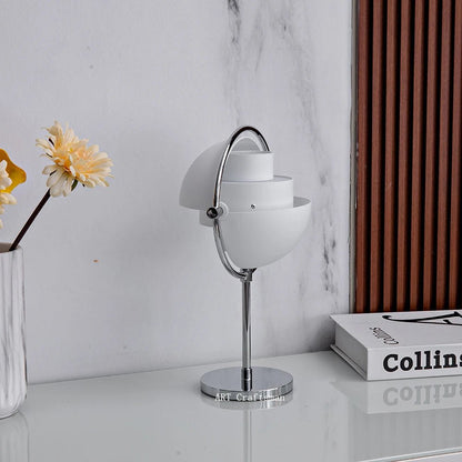 Lampe de table design moderne en métal noir et or, lumière chaude cosy - Luminous Place