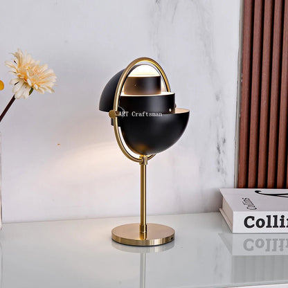 Lampe de table design moderne en métal noir et or, lumière chaude cosy - Luminous Place
